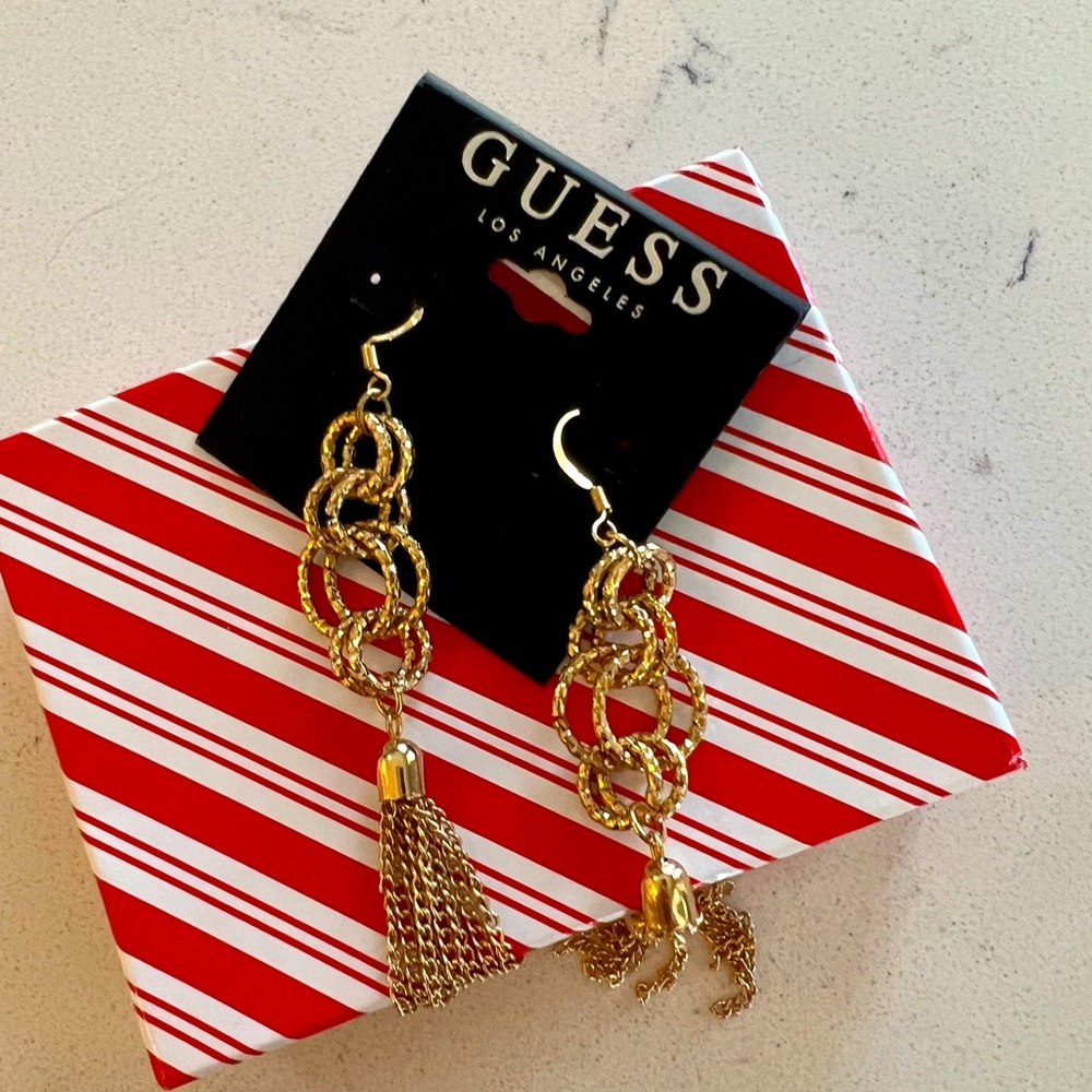 Guess gold colored dangle earrings